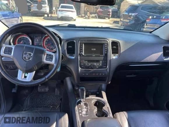 2013 Dodge Durango Crew with VIN 1C4SDHDT1DC697618, listed as a Copart auction lot 88926165 with 128,218 mi miles and Clean title. Bid and sale history available at DreamBid. Image 9.