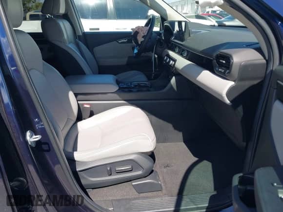 2024 Honda Pilot EX-L with VIN 5FNYG2H57RB004488, listed as a IAAI auction lot 41796097 with 18,479 mi miles and . Bid and sale history available at DreamBid. Image 5.