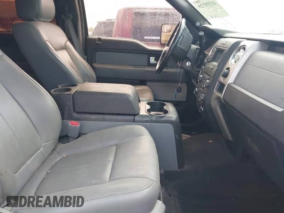 2014 Ford F-150 XLT with VIN 1FTFW1EF9EKD51674, listed as a IAAI auction lot 43359729 with 223,352 mi miles and . Bid and sale history available at DreamBid. Image 5.