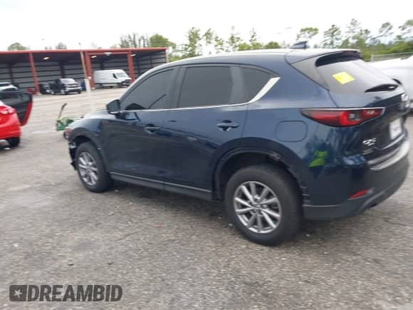 2023 Mazda CX-5 S Preferred z VIN JM3KFBCMXP0209359, wystawiony jako IAAI lot #42724622 z przebiegiem 14 682 mil mil oraz . Historia ofert i sprzedaży dostępna na DreamBid. Obrazek 3.