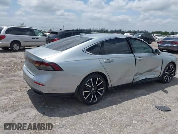 2024 Honda Accord Touring with VIN 1HGCY2F80RA083131, listed as a IAAI auction lot 42091756 with 4,852 mi miles and . Bid and sale history available at DreamBid. Image 4.