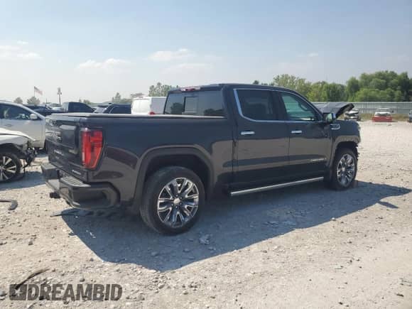 2023 GMC Sierra 1500 Denali z VIN 3GTUUGED7PG111838, wystawiony jako Copart lot #63683155 z przebiegiem Nie podano mil oraz Czysty tytuł • Clean title. Historia ofert i sprzedaży dostępna na DreamBid. Obrazek 3.