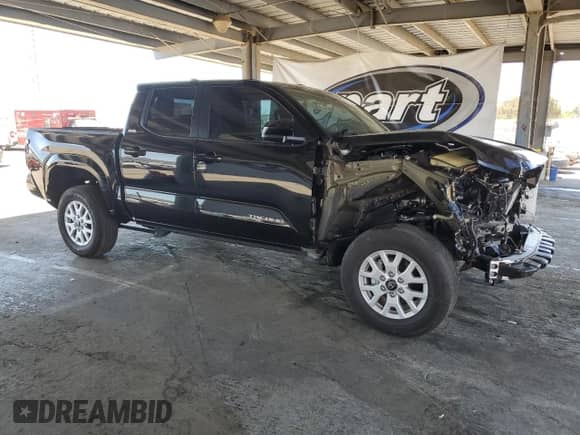 2024 Toyota Tacoma SR5 with VIN 3TMKB5FN9RM023449, listed as a Copart auction lot 67866095 with 5,550 mi miles and Salvage title. Bid and sale history available at DreamBid. Image 4.