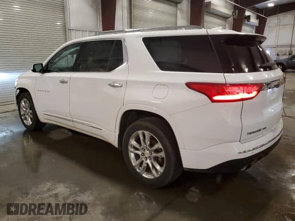 2018 Chevrolet Traverse High Country z VIN 1GNEVKKW3JJ211717, wystawiony jako Copart lot #69195595 z przebiegiem 147 642 mil mil oraz Szkoda całkowita • Salvage title. Historia ofert i sprzedaży dostępna na DreamBid. Obrazek 2.