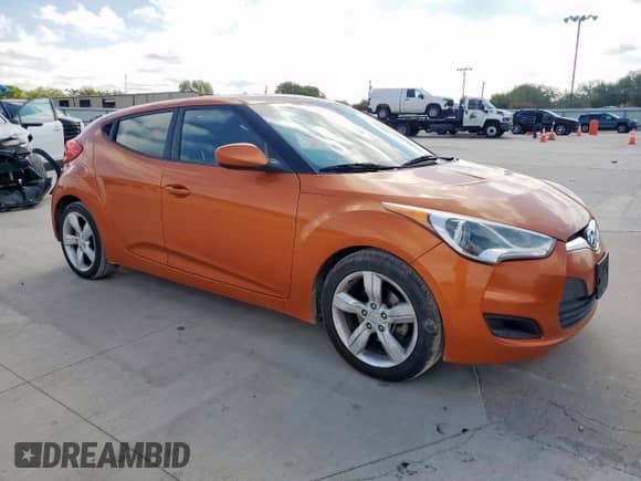 2013 Hyundai Veloster w/Black Int z VIN KMHTC6AD8DU118235, wystawiony jako Copart lot #81145875 z przebiegiem 164 057 mil mil oraz Szkoda całkowita • Salvage title. Historia ofert i sprzedaży dostępna na DreamBid. Obrazek 4.