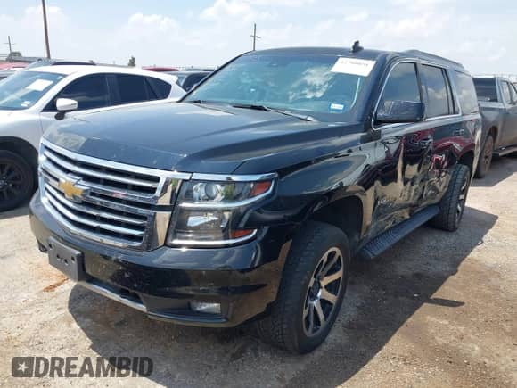 2018 Chevrolet Tahoe LT z VIN 1GNSKBKC3JR101172, wystawiony jako IAAI lot #42760851 z przebiegiem 124 409 mil mil oraz . Historia ofert i sprzedaży dostępna na DreamBid. Obrazek 17.