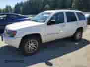 2004 Jeep Grand Cherokee with VIN 1J4GX58J64C158409, listed as a Copart auction lot 66751745 with 184,209 mi miles and Clean title. Bid and sale history available at DreamBid. Image 1.