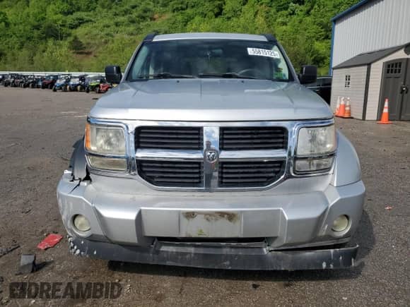 2009 Dodge Nitro SE with VIN 1D8GU28K49W541908, listed as a Copart auction lot 55815125 with 101,710 mi miles and Salvage title. Bid and sale history available at DreamBid. Image 5.