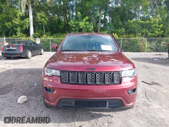2018 Jeep Grand Cherokee Laredo E with VIN 1C4RJEAG3JC380531, listed as a IAAI auction lot 43147543 with 96,871 mi miles and . Bid and sale history available at DreamBid. Image 12.