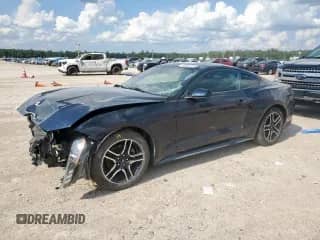 2021 Ford Mustang EcoBoost z VIN 1FA6P8TH8M5110069, wystawiony jako Copart lot #68392945 z przebiegiem 88 583 mil mil oraz Czysty tytuł • Clean title. Historia ofert i sprzedaży dostępna na DreamBid. Obrazek 1.