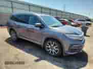 2020 Honda Pilot Elite z VIN 5FNYF6H02LB032625, wystawiony jako Copart lot #69782685 z przebiegiem 68 084 mil mil oraz Czysty tytuł • Clean title. Historia ofert i sprzedaży dostępna na DreamBid. Obrazek 4.