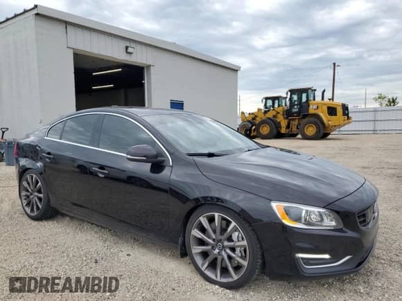 2015 Volvo S60 с VIN YV1902TL2F2368342, выставлен на аукционе Copart как лот 63053745 с пробегом 72 095 миль миль и Списание • Salvage title. История ставок и продаж доступна на DreamBid. Изображение 4.