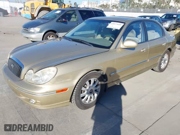 2003 Hyundai Sonata GLS z VIN KMHWF35HX3A867148, wystawiony jako IAAI lot #43577935 z przebiegiem 79 140 mil mil oraz . Historia ofert i sprzedaży dostępna na DreamBid. Obrazek 2.