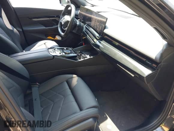 2024 BMW 5 Series 530i xDrive with VIN WBA53FJ00RCS54220, listed as a IAAI auction lot 42403628 with 19,047 mi miles and . Bid and sale history available at DreamBid. Image 5.