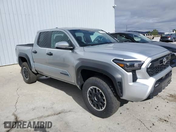 2024 Toyota Tacoma TRD Off Road with VIN 3TMLB5JN6RM029446, listed as a Copart auction lot 86650705 with 27,292 mi miles and Clean title. Bid and sale history available at DreamBid. Image 4.