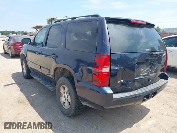 2007 Chevrolet Tahoe LT with VIN 1GNFC13J67R165897, listed as a IAAI auction lot 43088381 with 204,561 mi miles and . Bid and sale history available at DreamBid. Image 3.