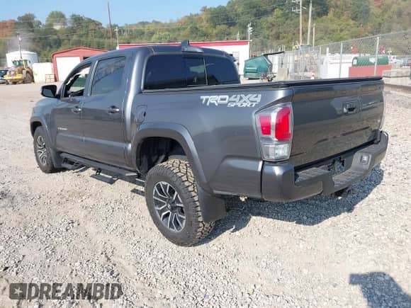 2021 Toyota Tacoma SR with VIN 3TYCZ5AN0MT027247, listed as a IAAI auction lot 43234020 with 26,058 mi miles and . Bid and sale history available at DreamBid. Image 3.