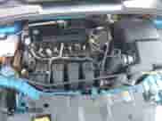 2015 Ford Focus SE z VIN 1FADP3K23FL242002, wystawiony jako IAAI lot #43229105 z przebiegiem 181 919 mil mil oraz . Historia ofert i sprzedaży dostępna na DreamBid. Obrazek 10.