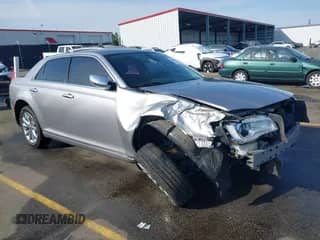 2018 Chrysler 300 Limited z VIN 2C3CCAKG1JH194995, wystawiony jako IAAI lot #41865875 z przebiegiem 138 982 mil mil oraz . Historia ofert i sprzedaży dostępna na DreamBid. Obrazek 1.