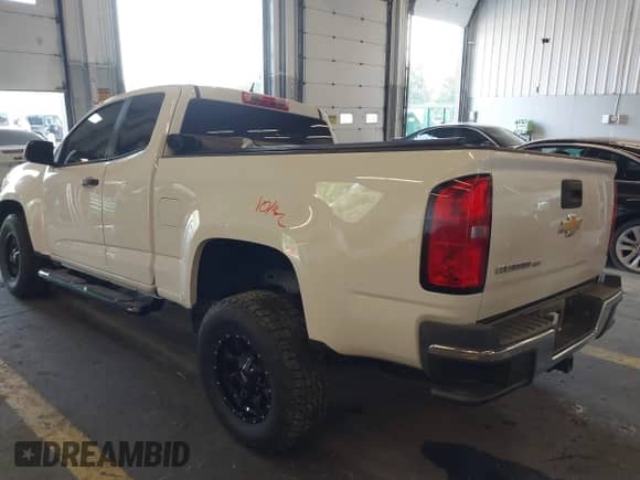 2019 Chevrolet Colorado 2WD Work Truck z VIN 1GCHSBEN7K1158829, wystawiony jako IAAI lot #40285519 z przebiegiem 71 550 mil mil oraz . Historia ofert i sprzedaży dostępna na DreamBid. Obrazek 3.