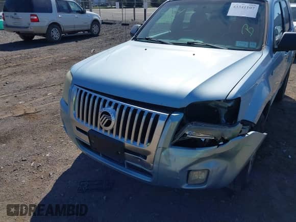 2008 Mercury Mariner with VIN 4M2CU91198KJ24730, listed as a IAAI auction lot 43341107 with 158,521 mi miles and . Bid and sale history available at DreamBid. Image 6.