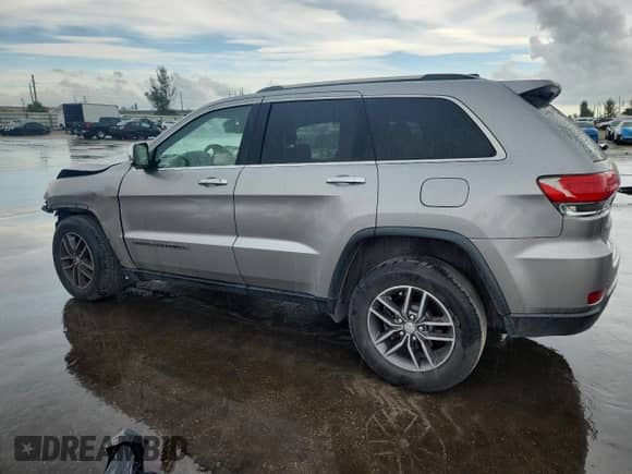 2017 Jeep Grand Cherokee Limited with VIN 1C4RJEBG6HC934007, listed as a Copart auction lot 80958775 with 141,111 mi miles and Salvage title. Bid and sale history available at DreamBid. Image 2.