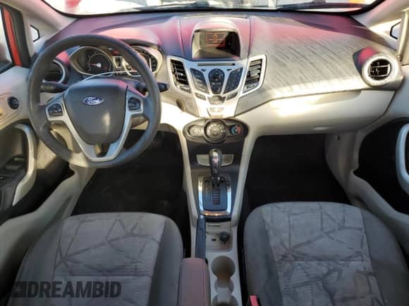 2012 Ford Fiesta SE with VIN 3FADP4BJ0CM128806, listed as a Copart auction lot 84610085 with 128,784 mi miles and Salvage title. Bid and sale history available at DreamBid. Image 8.