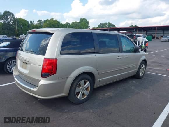 2013 Dodge Grand Caravan SE with VIN 2C4RDGBG0DR736480, listed as a IAAI auction lot 42885110 with 157,685 mi miles and . Bid and sale history available at DreamBid. Image 4.