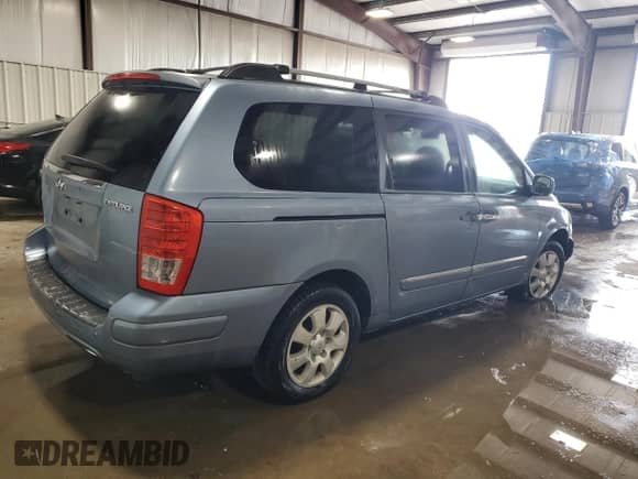 2007 Hyundai Entourage GLS with VIN KNDMC233076025109, listed as a Copart auction lot 74586814 with 124,057 mi miles and Salvage title. Bid and sale history available at DreamBid. Image 3.