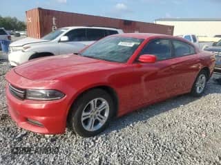 2015 Dodge Charger SE with VIN 2C3CDXBG4FH729518, listed as a Copart auction lot 85353305 with 140,467 mi miles and Salvage title. Bid and sale history available at DreamBid. Image 1.
