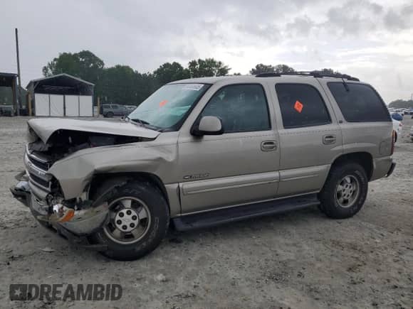 2000 Chevrolet Tahoe LS z VIN 1GNEC13T0YJ197788, wystawiony jako Copart lot #54483805 z przebiegiem Nie podano mil oraz Szkoda całkowita • Salvage title. Historia ofert i sprzedaży dostępna na DreamBid. Obrazek 1.