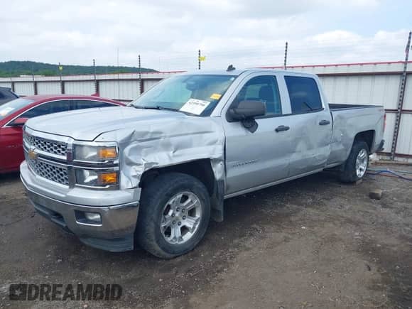 2014 Chevrolet Silverado 1500 LT with VIN 1GCUKREC6EF194475, listed as a IAAI auction lot 42390790 with 165,802 mi miles and . Bid and sale history available at DreamBid. Image 2.