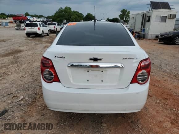 2013 Chevrolet Sonic LT with VIN 1G1JD5SH7D4229209, listed as a Copart auction lot 59058675 with 186,075 mi miles and Salvage title. Bid and sale history available at DreamBid. Image 6.