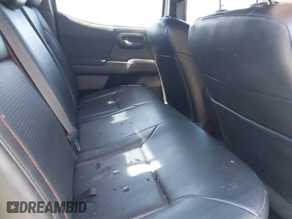 2018 Toyota Tacoma SR with VIN 5TFCZ5AN4JX133783, listed as a IAAI auction lot 42130141 with 116,543 mi miles and . Bid and sale history available at DreamBid. Image 8.