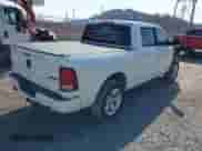 2014 Ram 1500 Sport with VIN 1C6RR7MT2ES203047, listed as a IAAI auction lot 41792890 with 136,905 mi miles and . Bid and sale history available at DreamBid. Image 4.