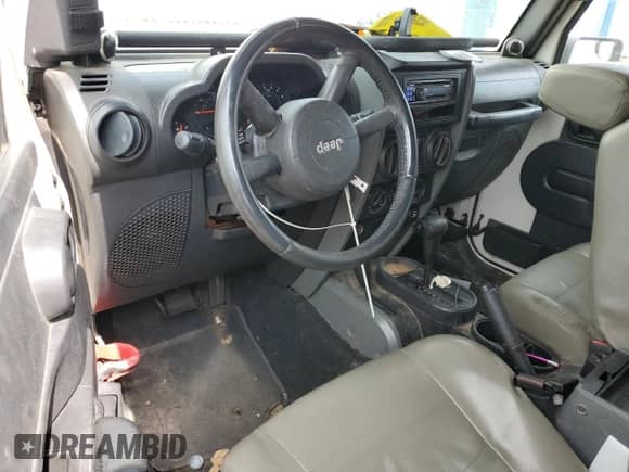 2008 Jeep Wrangler X с VIN 1J4FA24118L627350, выставлен на аукционе Copart как лот 82374345 с пробегом 217 748 миль миль и Списание • Salvage title. История ставок и продаж доступна на DreamBid. Изображение 8.