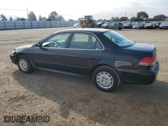 2001 Honda Accord LX with VIN 3HGCG665X1G703358, listed as a Copart auction lot 68412865 with 233,615 mi miles and Salvage title. Bid and sale history available at DreamBid. Image 2.