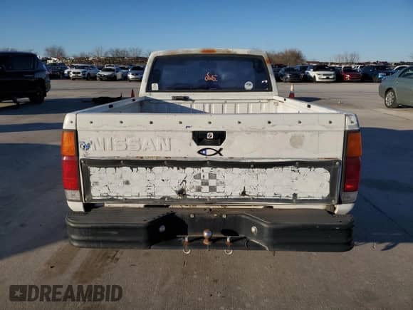 1992 Nissan Frontier z VIN 1N6SD11S8NC314484, wystawiony jako Copart lot #43559245 z przebiegiem 168 357 mil mil oraz Czysty tytuł • Clean title. Historia ofert i sprzedaży dostępna na DreamBid. Obrazek 6.