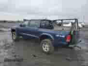 2003 Dodge Dakota Sport с VIN 1D7HG38N23S249446, выставлен на аукционе Copart как лот 88330655 с пробегом Не указан миль и Списание • Salvage title. История ставок и продаж доступна на DreamBid. Изображение 2.