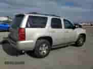 2014 Chevrolet Tahoe LT z VIN 1GNSKBE01ER190098, wystawiony jako Copart lot #59569965 z przebiegiem 192 291 mil mil oraz Szkoda całkowita • Salvage title. Historia ofert i sprzedaży dostępna na DreamBid. Obrazek 3.