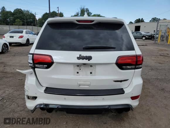 2020 Jeep Grand Cherokee Trackhawk с VIN 1C4RJFN90LC385190, выставлен на аукционе Copart как лот 68286714 с пробегом Не указан миль и Списание • Salvage title. История ставок и продаж доступна на DreamBid. Изображение 6.