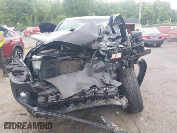 2018 Toyota Tacoma SR5 z VIN 5TFSZ5AN7JX129318, wystawiony jako IAAI lot #42318892 z przebiegiem 78 613 mil mil oraz . Historia ofert i sprzedaży dostępna na DreamBid. Obrazek 12.