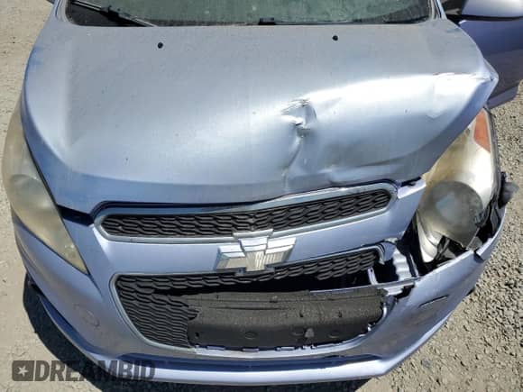 2014 Chevrolet Spark LS with VIN KL8CA6S9XEC578615, listed as a Copart auction lot 67090245 with 83,690 mi miles and Salvage title. Bid and sale history available at DreamBid. Image 11.