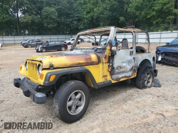 2000 Jeep Wrangler SE with VIN 1J4FA29P9YP787126, listed as a Copart auction lot 69889405 with Not provided miles and Non repairable. Bid and sale history available at DreamBid. Image 1.