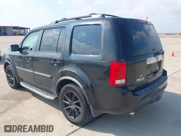 2012 Honda Pilot Touring with VIN 5FNYF4H93CB044933, listed as a IAAI auction lot 43249328 with 218,196 mi miles and . Bid and sale history available at DreamBid. Image 3.