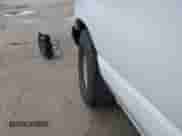 2000 Ford Econoline Cargo with VIN 1FTRE14W2YHB25933, listed as a IAAI auction lot 41912248 with 57,561 mi miles and . Bid and sale history available at DreamBid. Image 13.