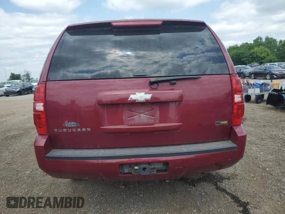 2007 Chevrolet Suburban LTZ with VIN 1GNFC16097R423736, listed as a Copart auction lot 59462805 with 124,276 mi miles and Salvage title. Bid and sale history available at DreamBid. Image 6.