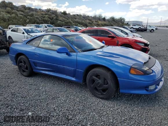 1992 Dodge Stealth with VIN JB3XE74C1NY057055, listed as a Copart auction lot 62794955 with 213,567 mi miles and Clean title. Bid and sale history available at DreamBid. Image 4.