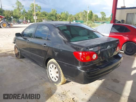 2003 Toyota Corolla LE with VIN 1NXBR32E03Z044128, listed as a IAAI auction lot 40446103 with 189,397 mi miles and . Bid and sale history available at DreamBid. Image 3.