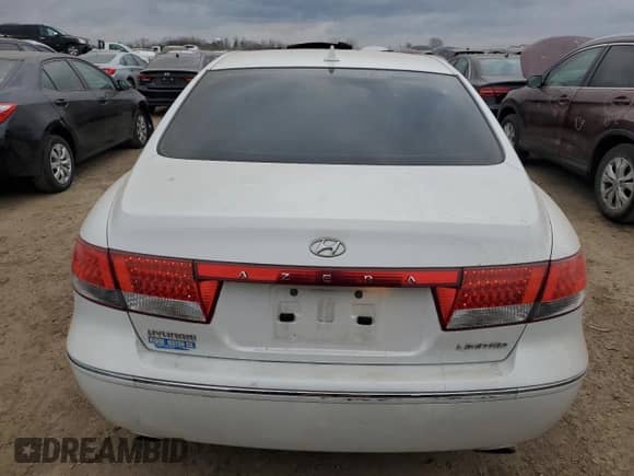 2009 Hyundai Azera Limited с VIN KMHFC46F69A387497, выставлен на аукционе Copart как лот 83303664 с пробегом 115 815 миль миль и Списание • Salvage title. История ставок и продаж доступна на DreamBid. Изображение 6.